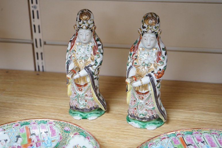 Five Chinese famille rose plates, Guangxu period and a pair of Chinese figures, 25cm in diameter. Condition - fair to good